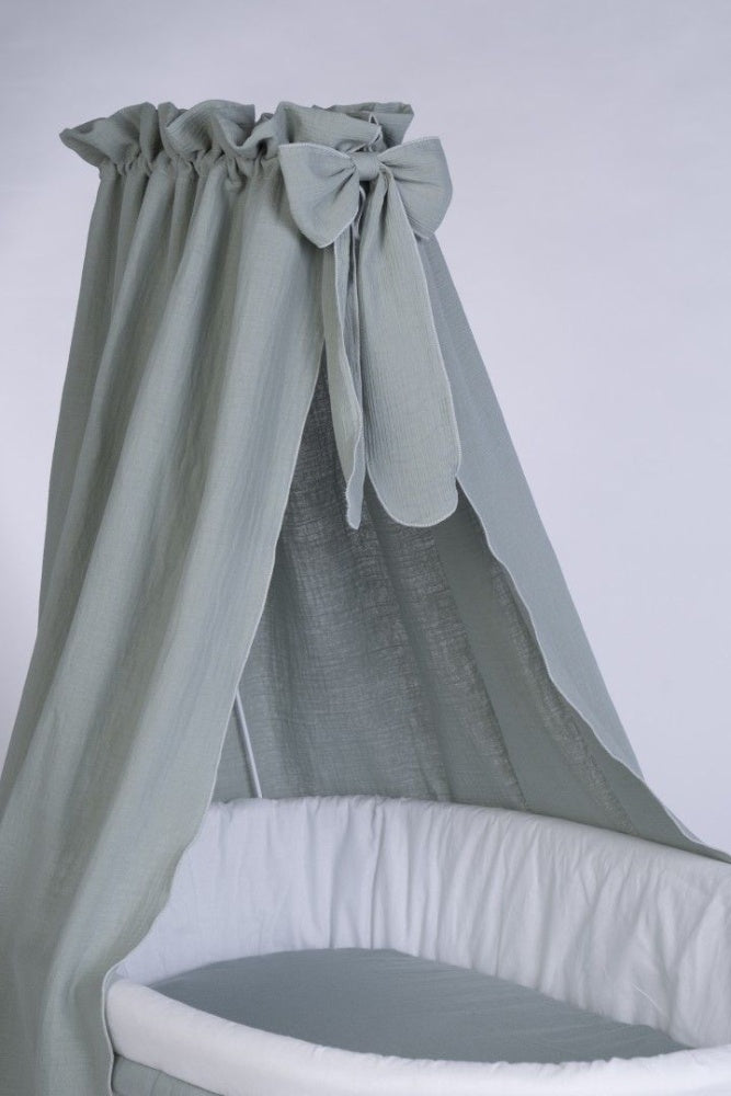Light gray fabric Stubenwagen canopy with large bow detail over white cushioned bassinet. - Mionido - Bollerwagen Tony (natur)