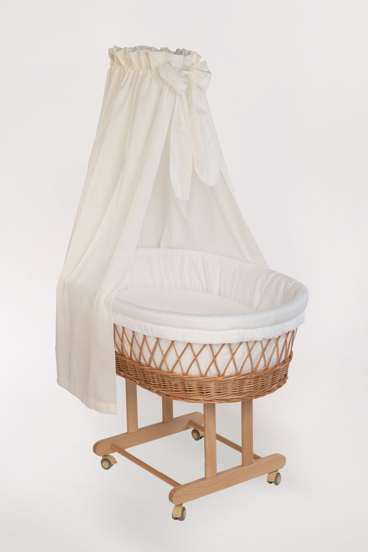 Natural wicker Stubenwagen with white canopy and soft white bedding on wooden frame with wheels. - Mionido - Stubenwagen Maxi (natur)